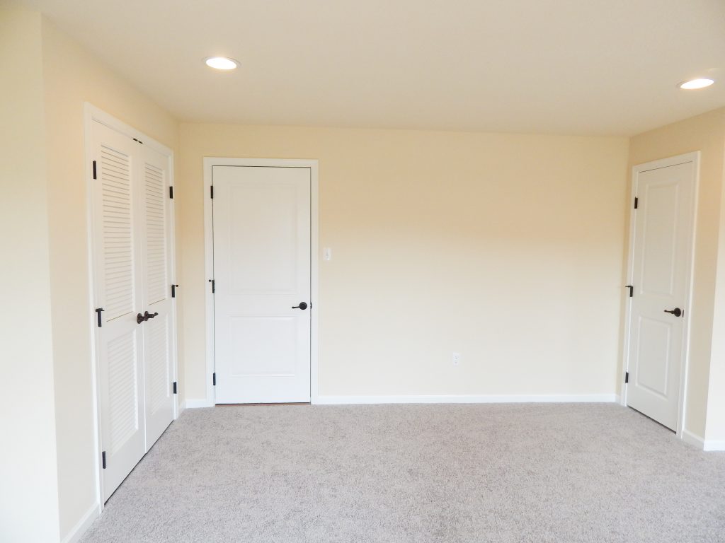 empty wall with doors mudroom