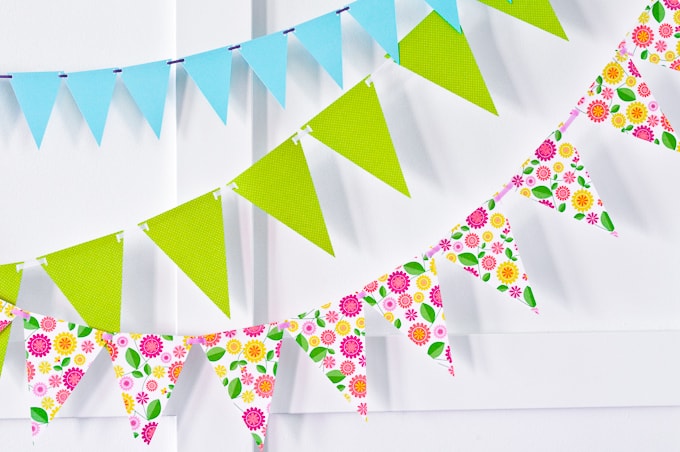 She shows you step by step how to make a banner using the Cricut Explore! Such an easy tutorial with great information!