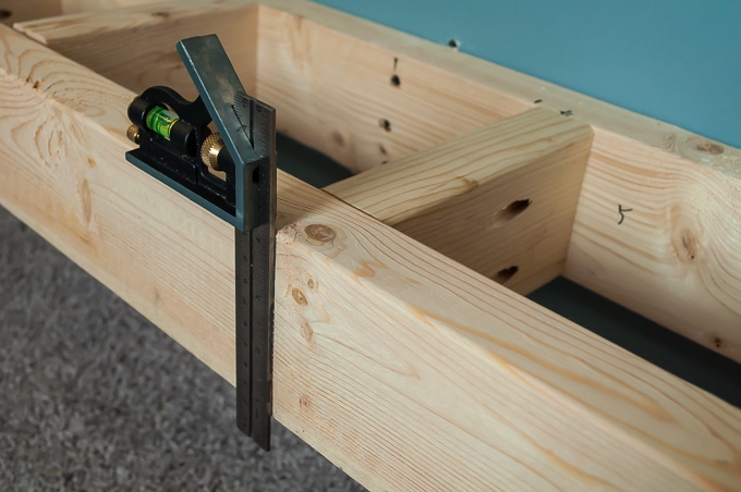 Step by step tutorial for building amazing floating shelves for an industrial masculine office. These only cost her $150 to build!