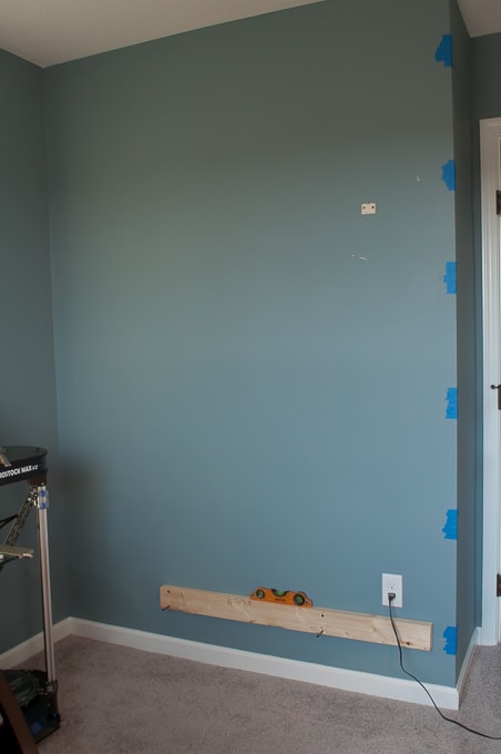 Step by step tutorial for building amazing floating shelves for an industrial masculine office. These only cost her $150 to build!