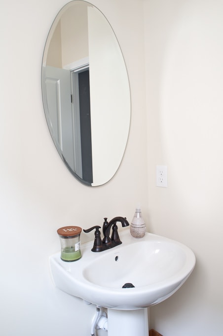 She shares her list of updates to transform her house into a home - this is the powder room list!