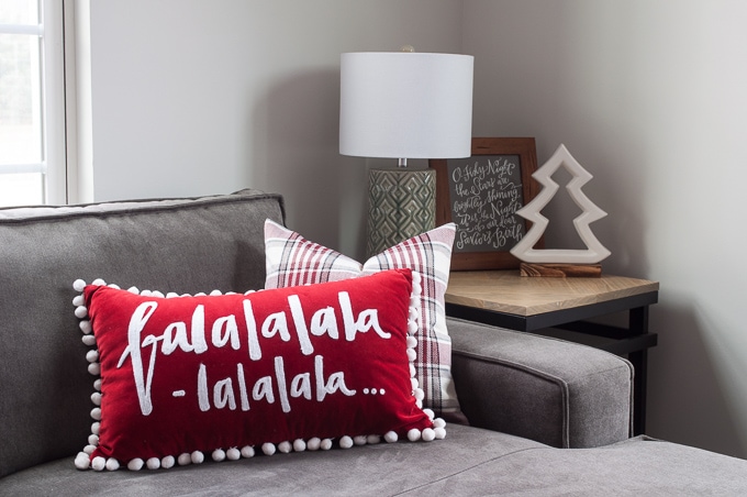 Modern meets Traditional Christmas Home Tour. This home mixes styles and creates a cozy Christmas living room with a beautiful real Christmas tree!