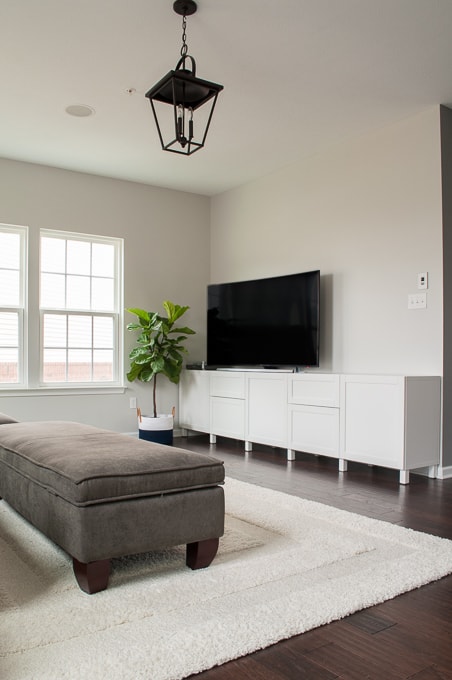 How to design a modern media center using IKEA BESTA cabinets. Get a built-in look on a budget.