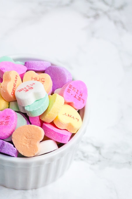 Easy Cricut Explore tutorial for "print then cut" conversation heart valentines! These are adorable and perfect for kids valentines!