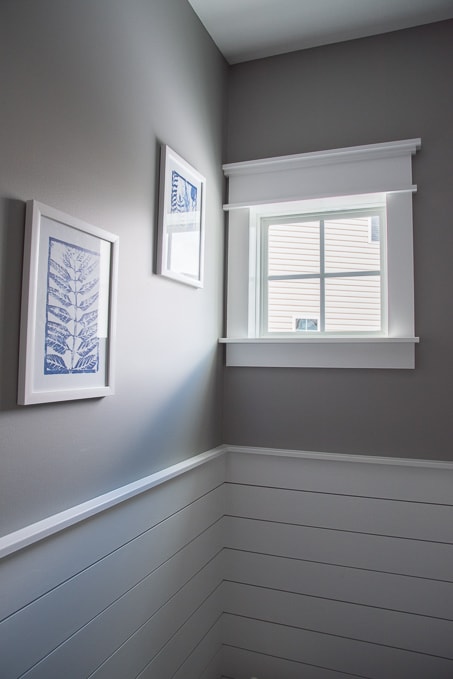 Check out this beautiful powder room reveal! This tiny bathroom was transformed from boring to fresh and modern! I love the shiplap and the modern classic decorations.