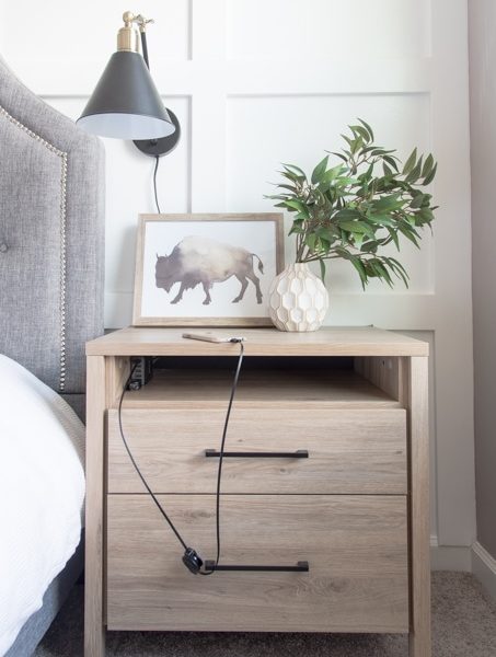 How to get rid of nightstand cable clutter. The best way to organize your wires and cords to create a charging station in your nightstand. Get rid of the mess once and for all!