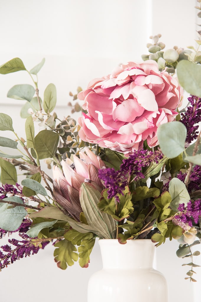 How to create a gorgeous fall floral arrangement. Beautiful jewel tone fall colors. Textured greens mixed with whimsical florals.