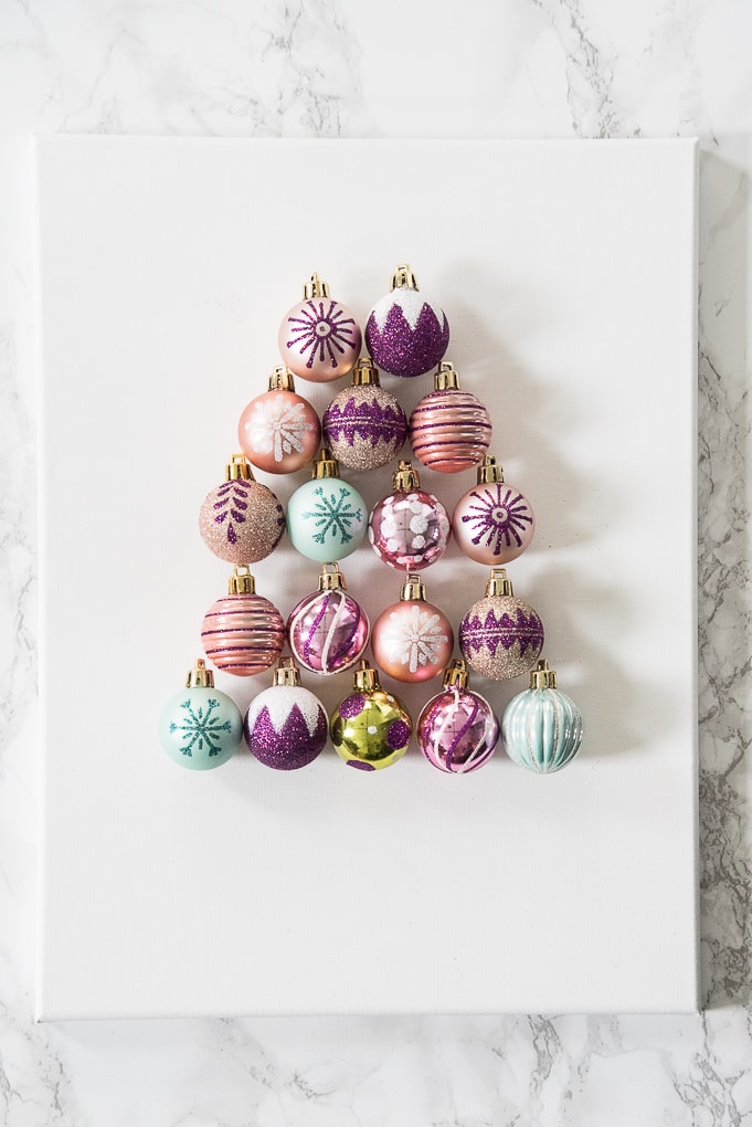 DIY Christmas Tree Ornament Art. Create a bright and modern art piece using Christmas ornaments. See other DIY home decor ideas in the Handmade Holidays Blog Hop!