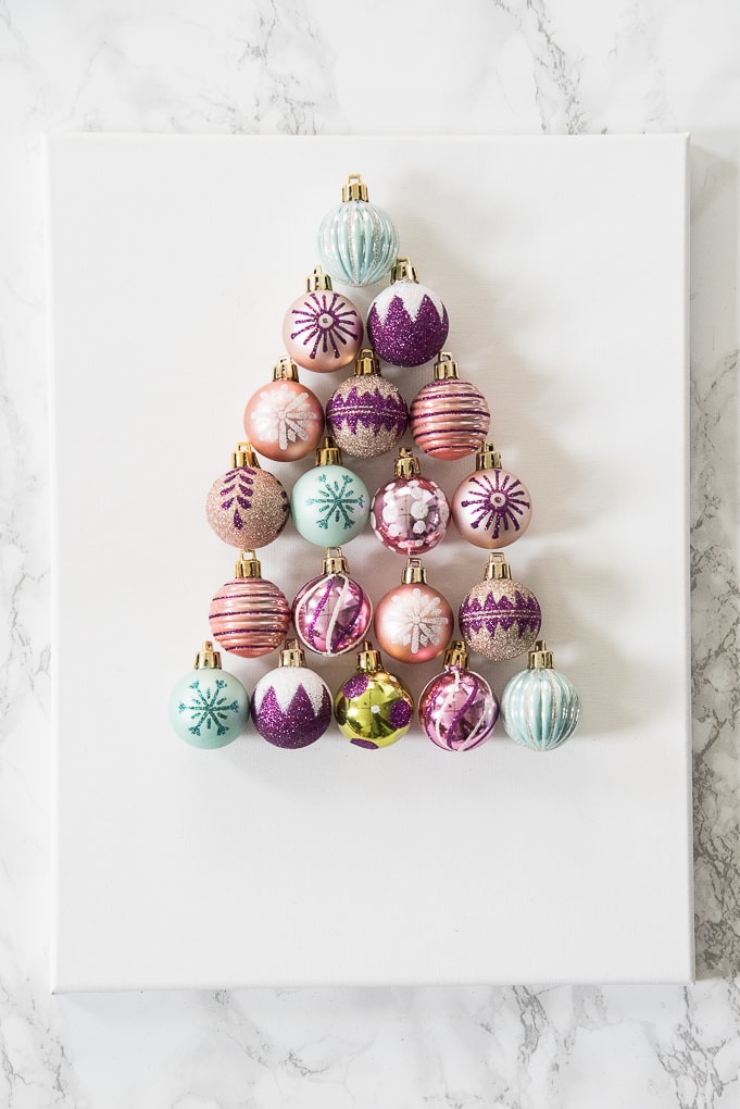 DIY Christmas Tree Ornament Art. Create a bright and modern art piece using Christmas ornaments. See other DIY home decor ideas in the Handmade Holidays Blog Hop!