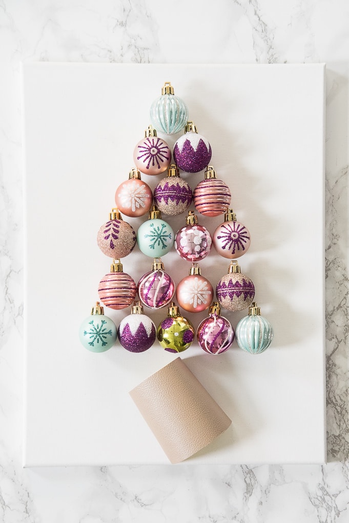 DIY Christmas Tree Ornament Art. Create a bright and modern art piece using Christmas ornaments. See other DIY home decor ideas in the Handmade Holidays Blog Hop!