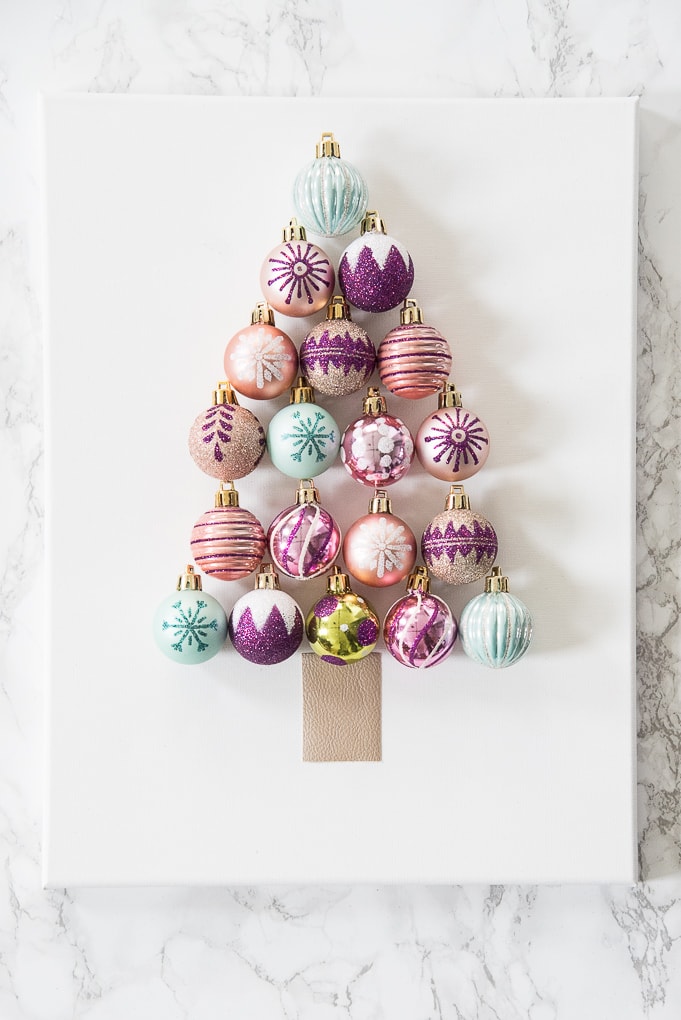 DIY Christmas Tree Ornament Art. Create a bright and modern art piece using Christmas ornaments. See other DIY home decor ideas in the Handmade Holidays Blog Hop!