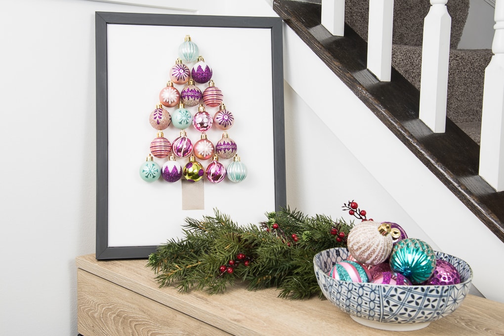 DIY Christmas Tree Ornament Art. Create a bright and modern art piece using Christmas ornaments. See other DIY home decor ideas in the Handmade Holidays Blog Hop!