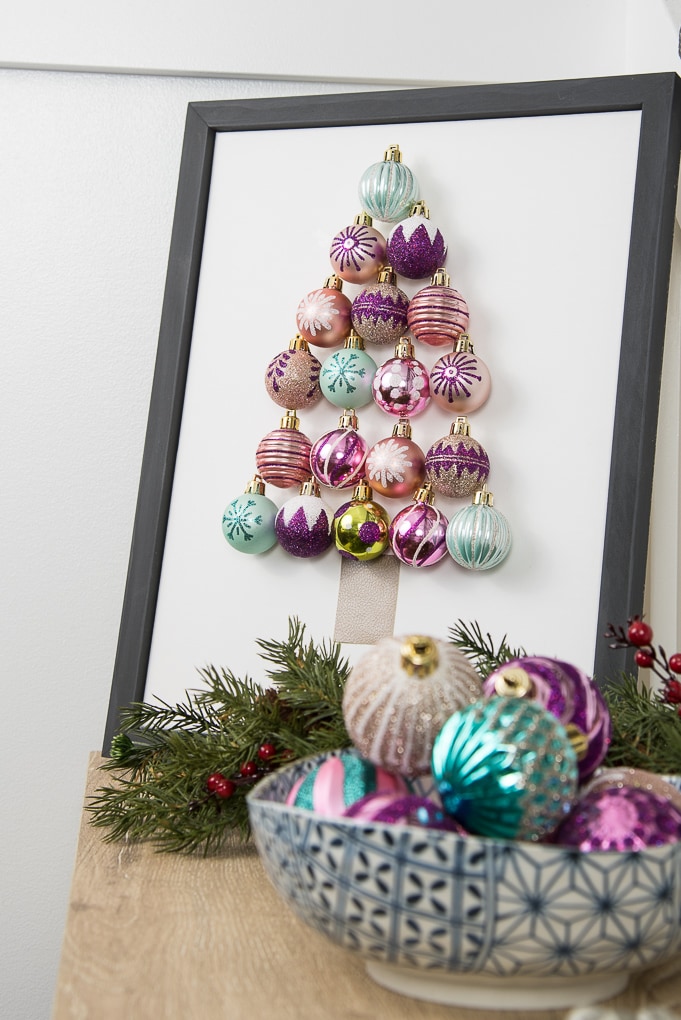 DIY Christmas Tree Ornament Art. Create a bright and modern art piece using Christmas ornaments. See other DIY home decor ideas in the Handmade Holidays Blog Hop!