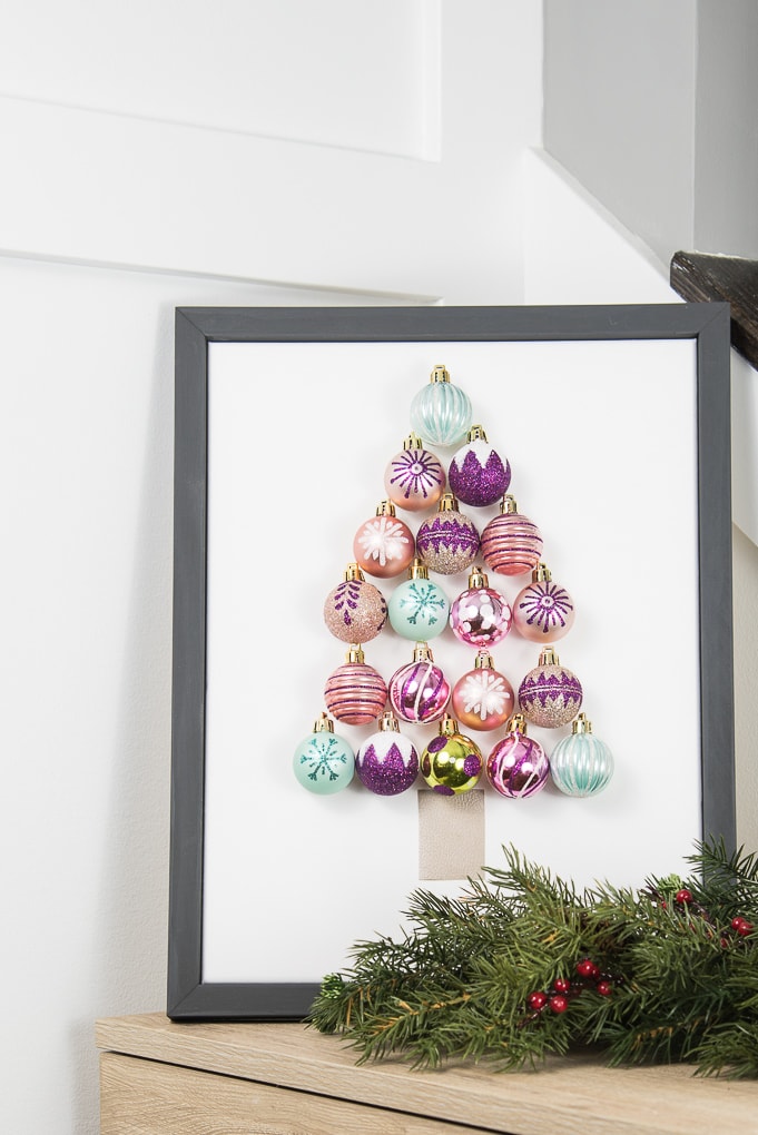 DIY Christmas Tree Ornament Art. Create a bright and modern art piece using Christmas ornaments. See other DIY home decor ideas in the Handmade Holidays Blog Hop!