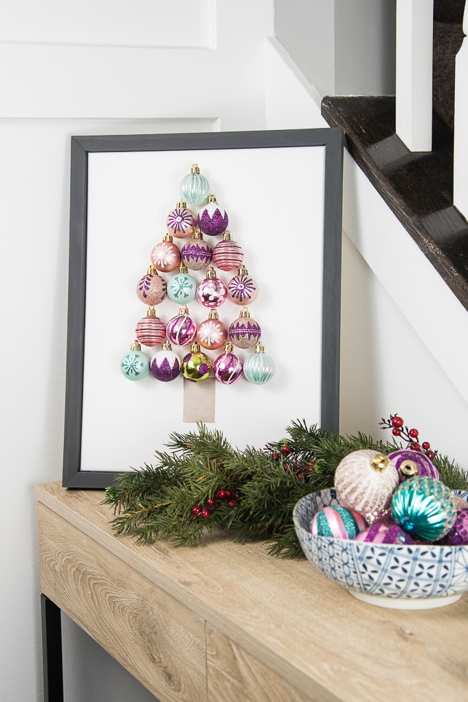 DIY Christmas Tree Ornament Art. Create a bright and modern art piece using Christmas ornaments. See other DIY home decor ideas in the Handmade Holidays Blog Hop!