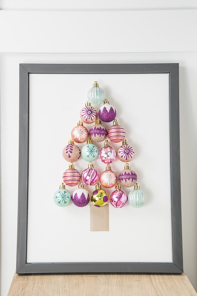 DIY Christmas Tree Ornament Art. Create a bright and modern art piece using Christmas ornaments. See other DIY home decor ideas in the Handmade Holidays Blog Hop!