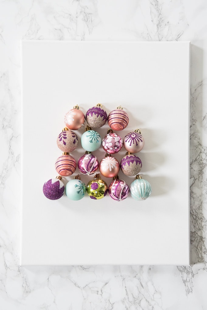 DIY Christmas Tree Ornament Art. Create a bright and modern art piece using Christmas ornaments. See other DIY home decor ideas in the Handmade Holidays Blog Hop!