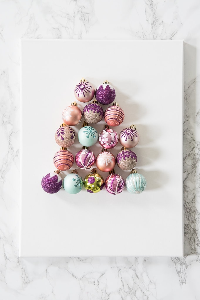 DIY Christmas Tree Ornament Art. Create a bright and modern art piece using Christmas ornaments. See other DIY home decor ideas in the Handmade Holidays Blog Hop!