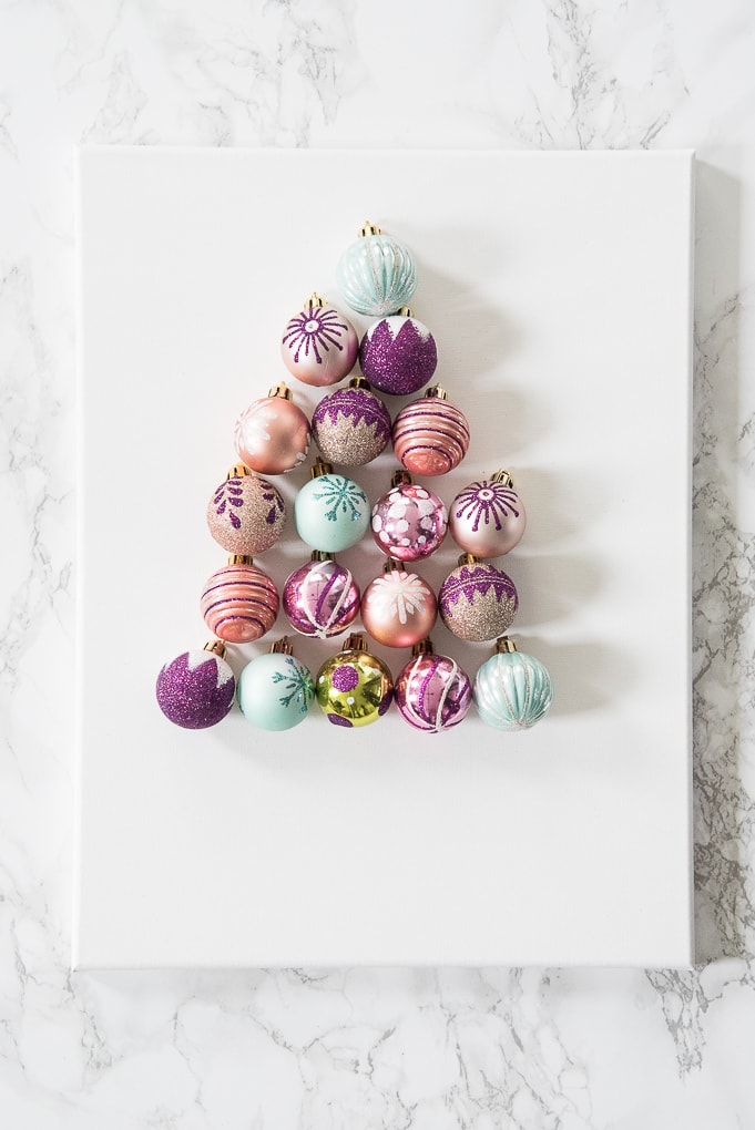 DIY Christmas Tree Ornament Art. Create a bright and modern art piece using Christmas ornaments. See other DIY home decor ideas in the Handmade Holidays Blog Hop!