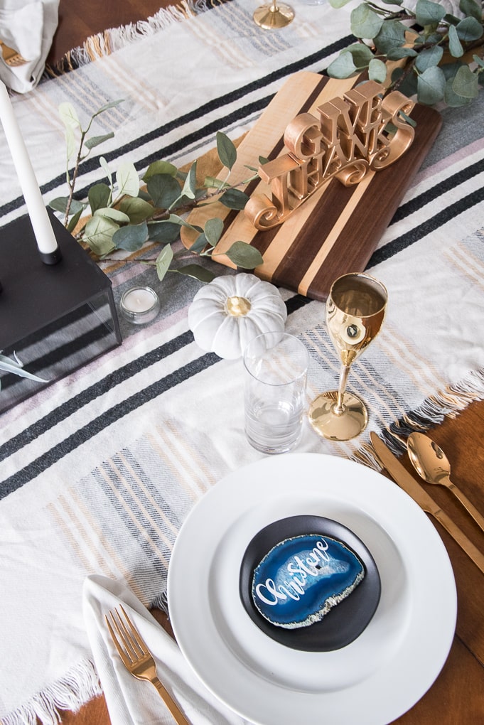 Create a beautiful and sophisticated modern classic Thanksgiving table. Bring in the colors, textures, and patterns of fall using simple and neutral pieces. Use agate slices for a unique place card idea.