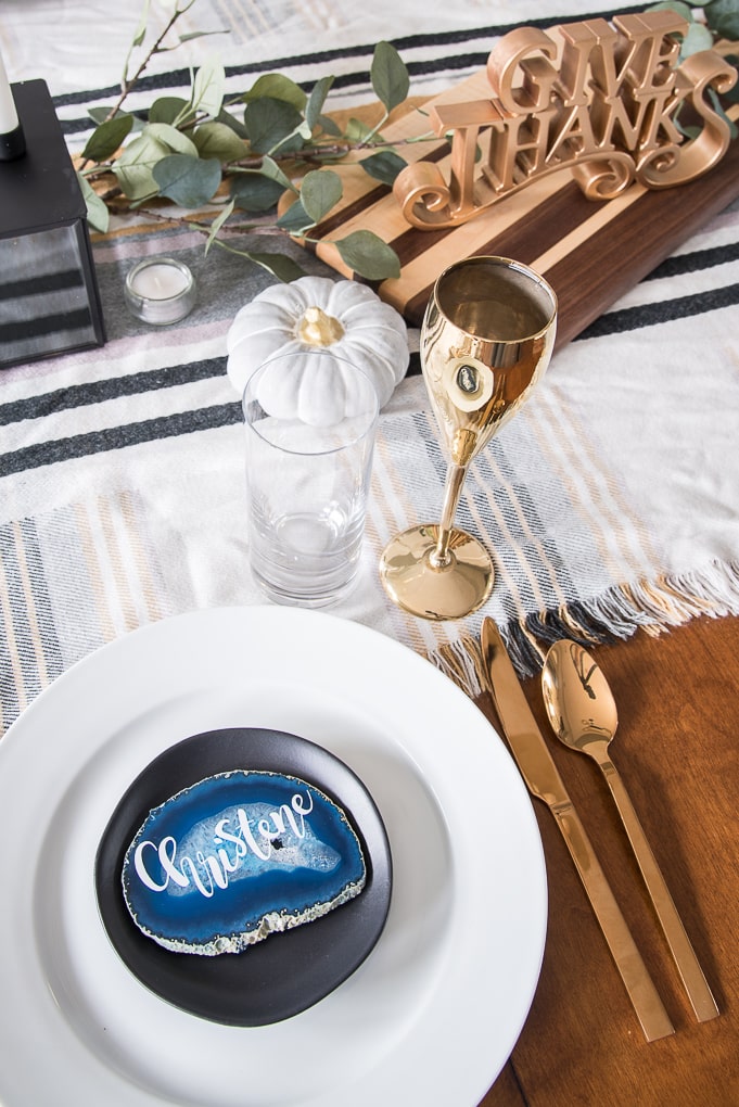 Create a beautiful and sophisticated modern classic Thanksgiving table. Bring in the colors, textures, and patterns of fall using simple and neutral pieces. Use agate slices for a unique place card idea.