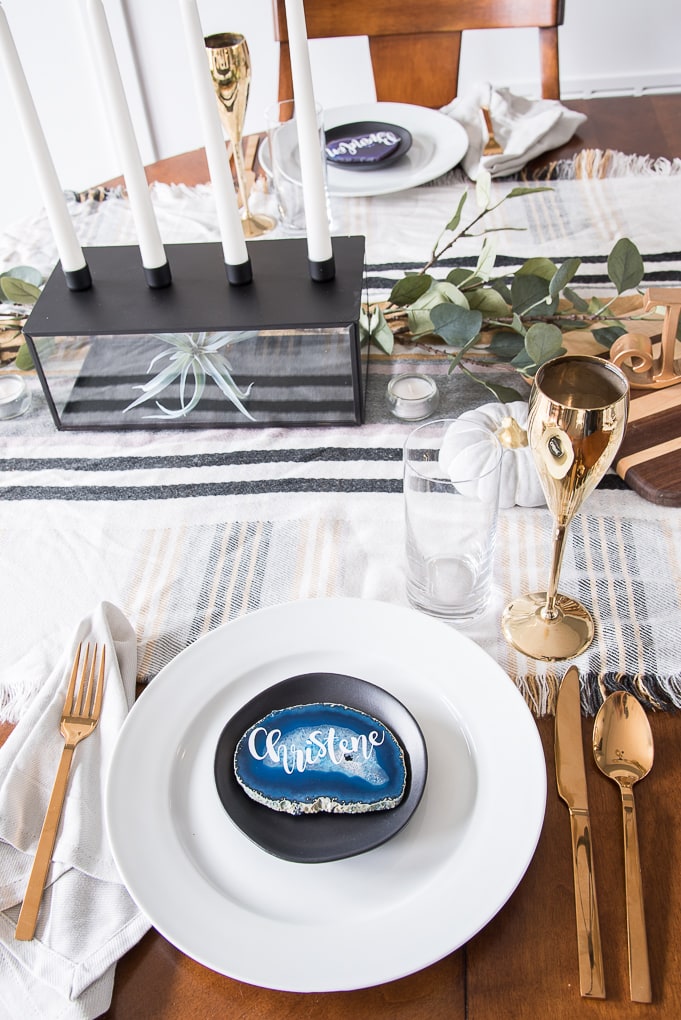 Create a beautiful and sophisticated modern classic Thanksgiving table. Bring in the colors, textures, and patterns of fall using simple and neutral pieces. Use agate slices for a unique place card idea.