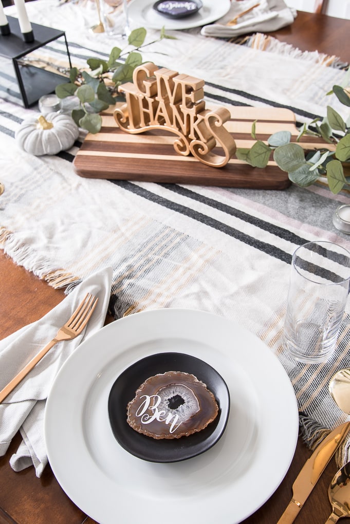 Create a beautiful and sophisticated modern classic Thanksgiving table. Bring in the colors, textures, and patterns of fall using simple and neutral pieces. Use agate slices for a unique place card idea.