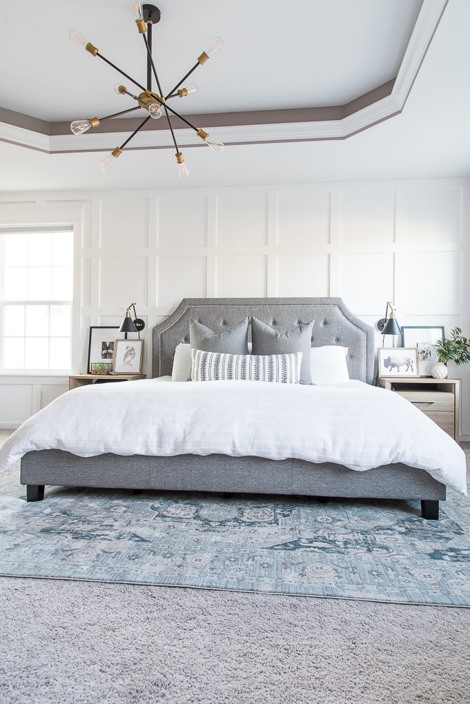 I’m so excited to give you a tour of our modern classic master bedroom! We tried to make it really relaxing and beautiful at the same time, with a mix of DIY projects, a few new pieces, and some decorative accents. Come on in and take the grand tour!