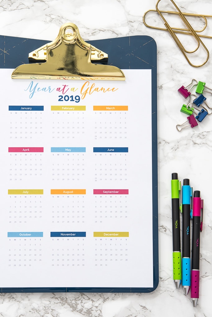 2019 year at a glance calendar up close with desk accessories