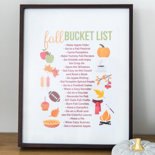 fall bucket list printable in a frame with a pumpkin