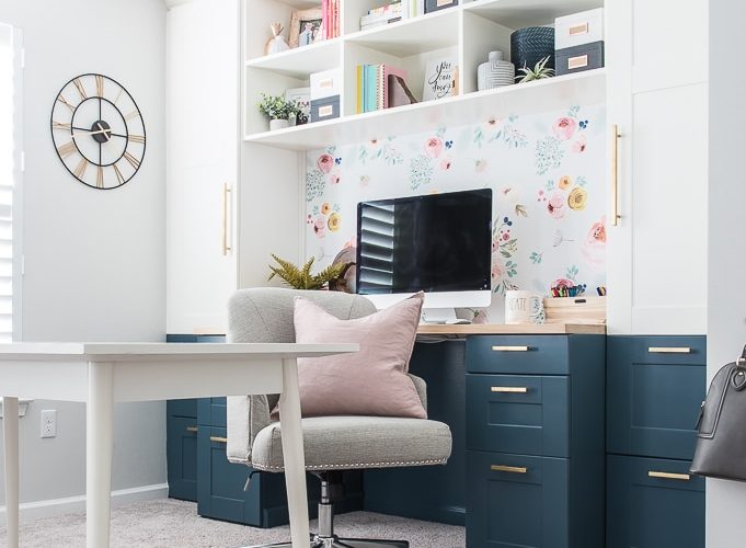 home office built-in desk IKEA SEKTION cabinets chair pink pillow