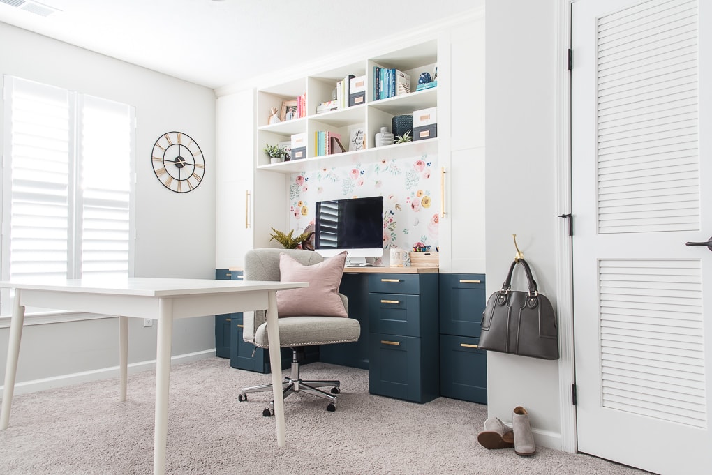 home office craft room IKEA SEKTION cabinets built-in desk and bookshelves