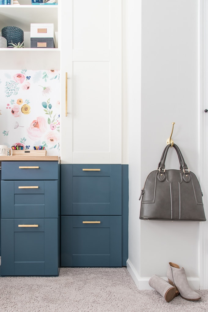 built-in desk navy and white with hanging purse and shoes