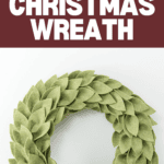 A green felt wreath with layered leaf patterns is displayed against a white background, reminiscent of a cozy winter night. The image features text at the top saying "DIY Felt Christmas Wreath" and at the bottom right, "cricut" along with a visible website URL.