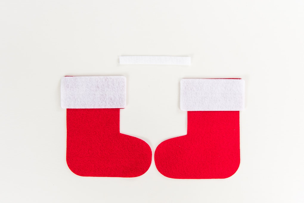 red and white felt cutouts layered for mini stocking