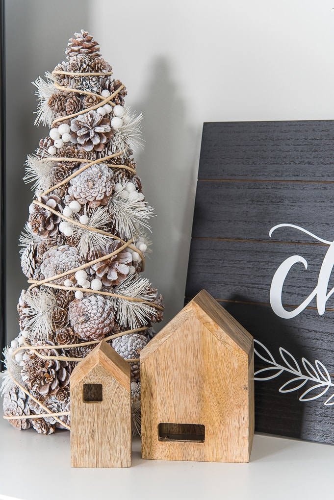 Pinecone Christmas tree decor and small wooden houses