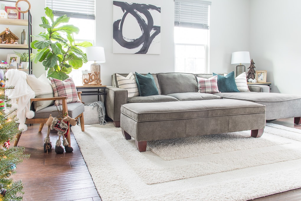 Christmas living room with gray sectional couch