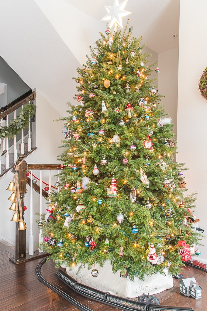 Traditional Fresh Christmas tree with family ornaments