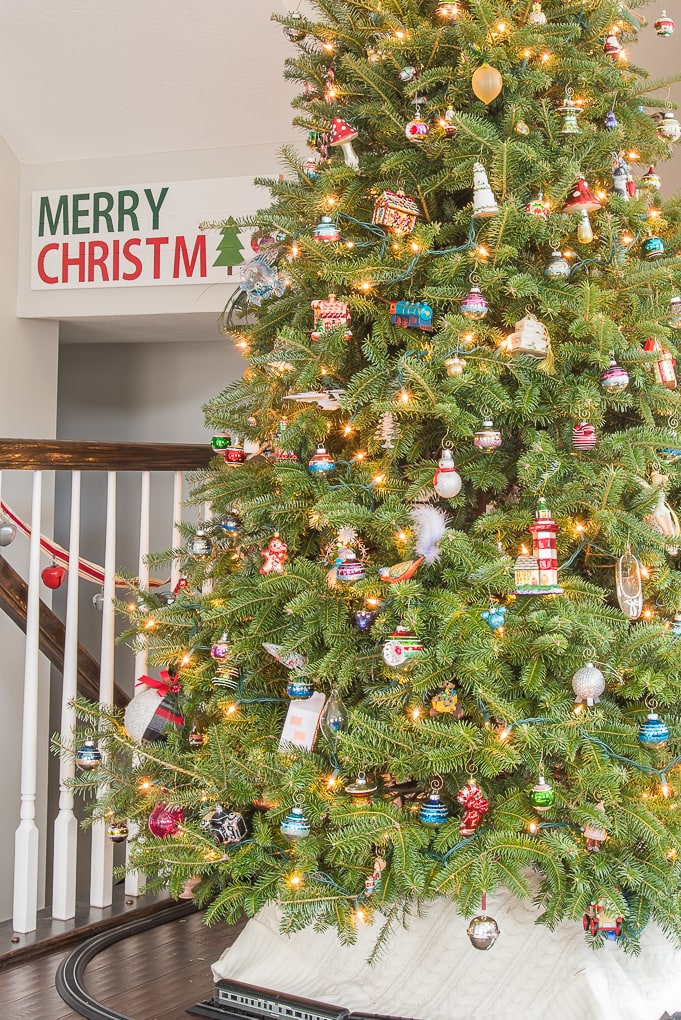 close up of fresh Christmas tree with family ornaments