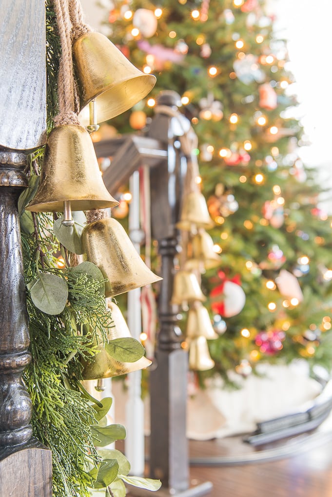 golden bells Christmas decor on staircase