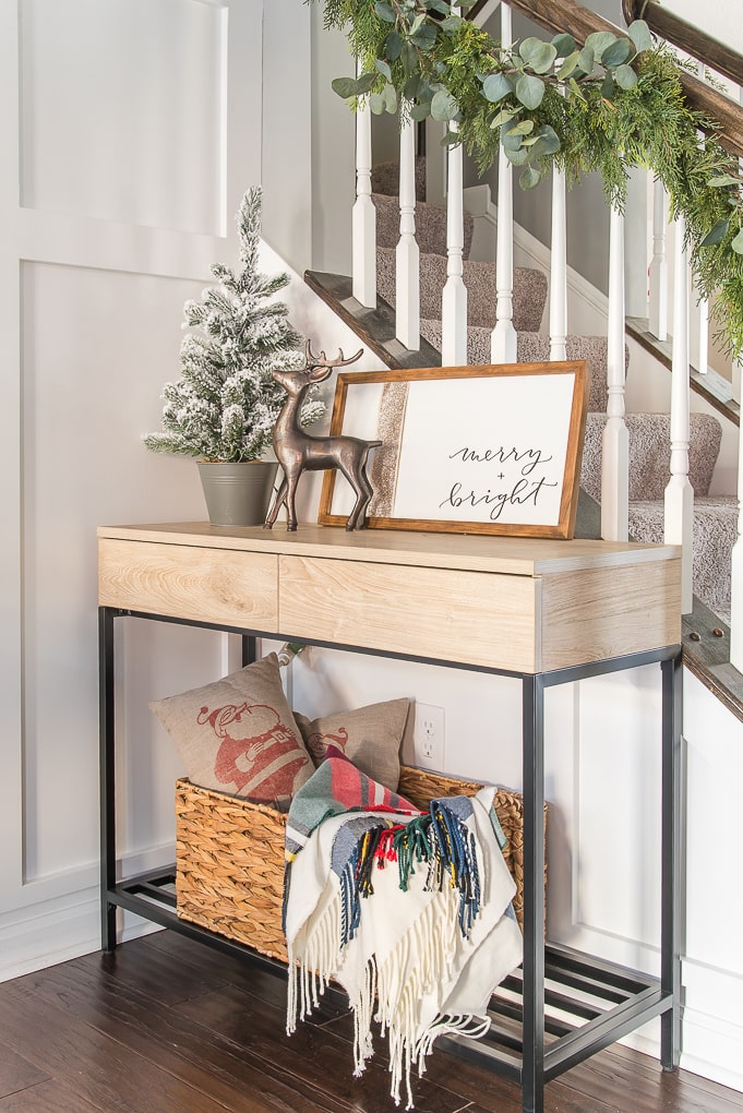 Modern console table decorated for Christmas home tour