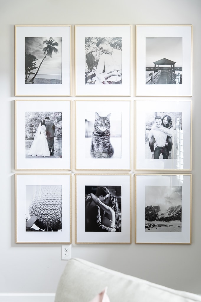gold frames with black and white photos gallery wall