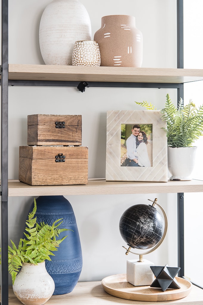 framed family photo on bookshelf