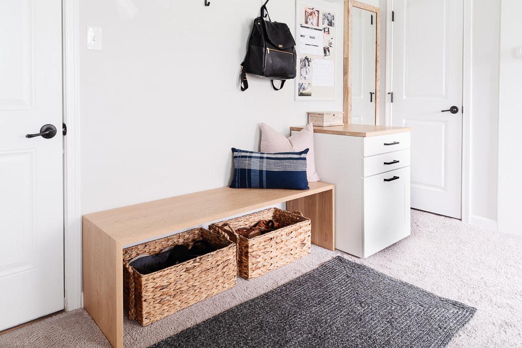 wooden white oak waterfall bench with baskets for shoes