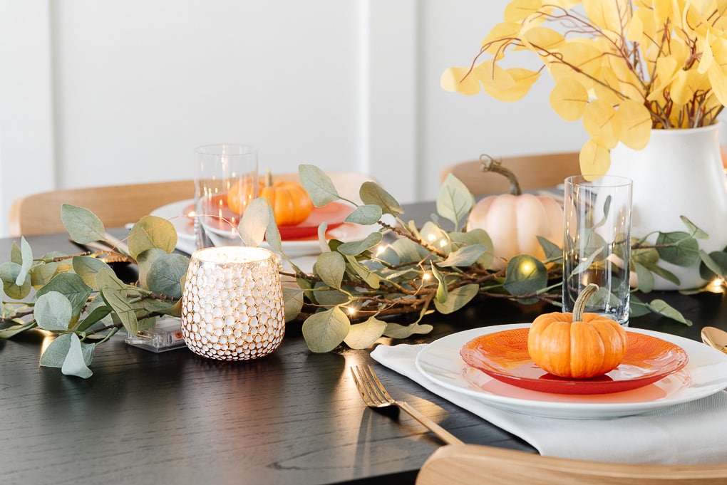 candle votives with faux eucalyptus thanksgiving table decor