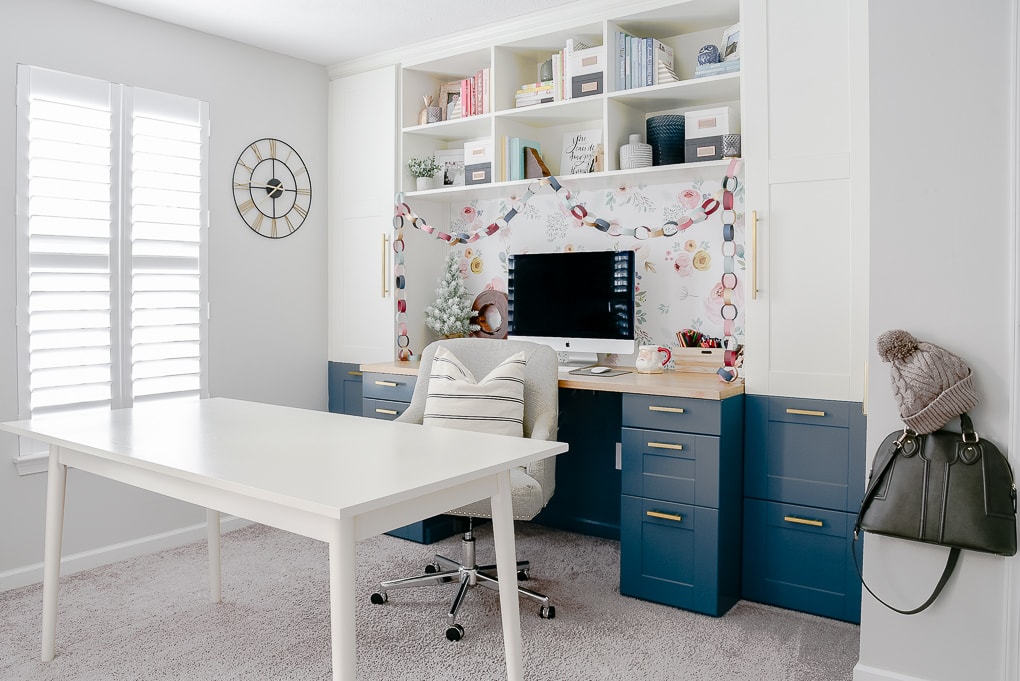 modern home office with built in desk decorated for Christmas