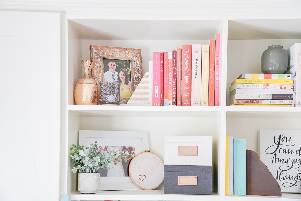 styled bookshelves colorful winter decor