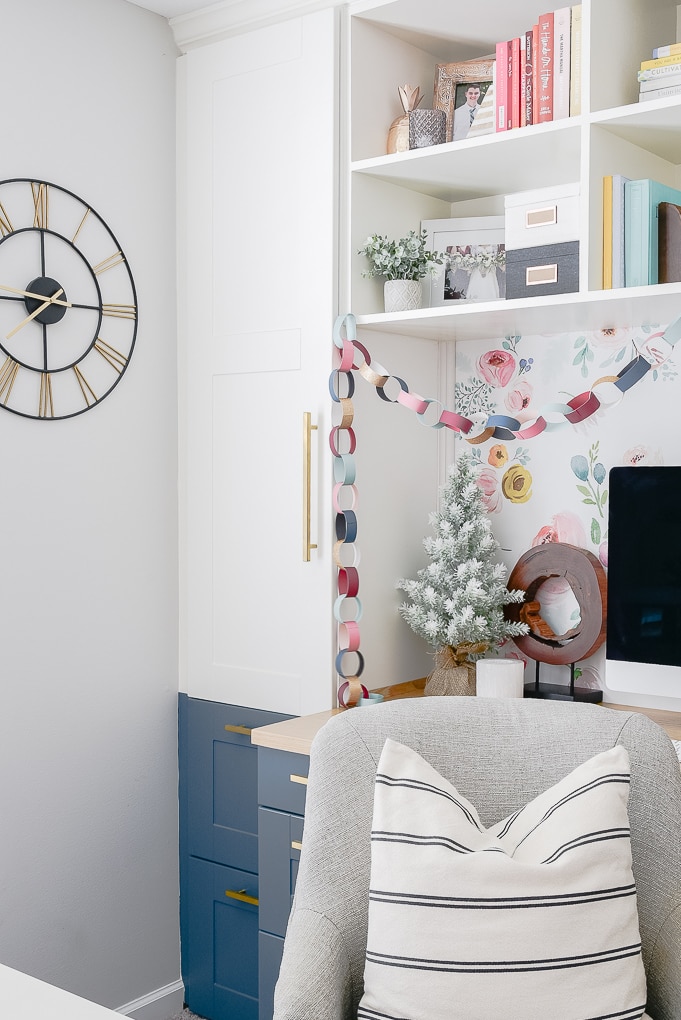 colorful Christmas decorations in a home office built in desk