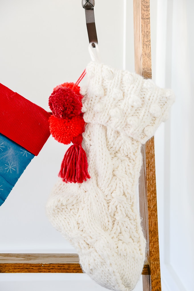 cream knitted Christmas stocking from Target Hearth and Hand collection hanging on stocking ladder
