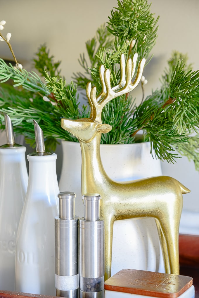 gold reindeer figurine in kitchen decor tray